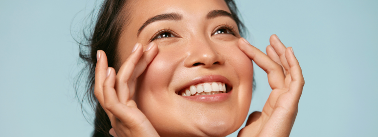 Close-up of a woman with glowing skin, symbolising a spring skincare reset.